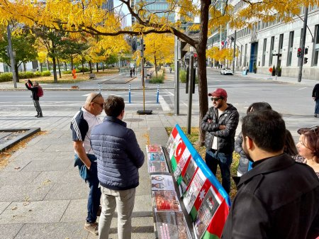 Monrealda Ermənistanın müharibə cinayətlərini ifşa edən məlumatlandırma aksiyası təşkil edilib